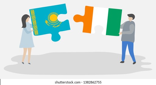 Couple holding two puzzles pieces with Kazakh and Ivorian flags. Kazakhstan and Ivory Coast national symbols together.