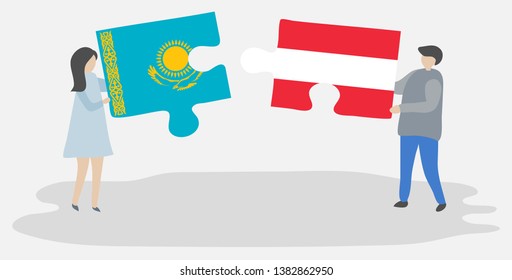 Couple holding two puzzles pieces with Kazakh and Austrian flags. Kazakhstan and Austria national symbols together.