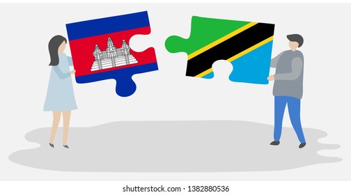 Couple holding two puzzles pieces with Cambodian and Tanzanian flags. Cambodia and Tanzania national symbols together.