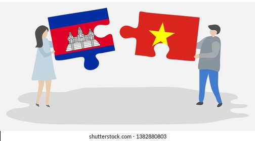 Couple holding two puzzles pieces with Cambodian and Vietnamese flags. Cambodia and Vietnam national symbols together.