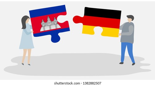Couple holding two puzzles pieces with Cambodian and German flags. Cambodia and Germany national symbols together.