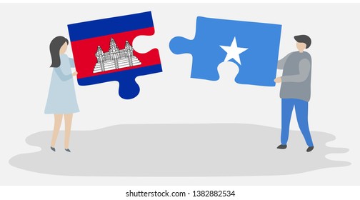 Couple holding two puzzles pieces with Cambodian and Somali flags. Cambodia and Somalia national symbols together.