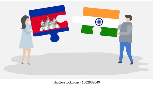 Couple holding two puzzles pieces with Cambodian and Indian flags. Cambodia and India national symbols together.