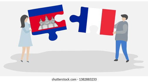 Couple holding two puzzles pieces with Cambodian and French flags. Cambodia and France national symbols together.