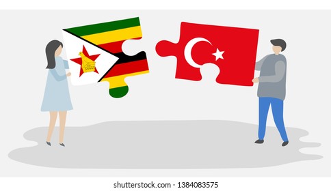 Couple holding two puzzles pieces with Zimbabwean and Turkish flags. Zimbabwe and Turkey national symbols together.
