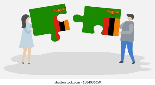 Couple holding two puzzles pieces with Zambian and Zambian flags. Zambia and Zambia national symbols together.