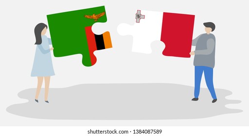 Couple holding two puzzles pieces with Zambian and Maltese flags. Zambia and Malta national symbols together.