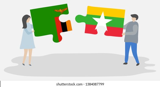 Couple holding two puzzles pieces with Zambian and Burmese flags. Zambia and Myanmar national symbols together.