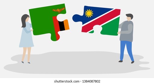 Couple holding two puzzles pieces with Zambian and Namibian flags. Zambia and Namibia national symbols together.