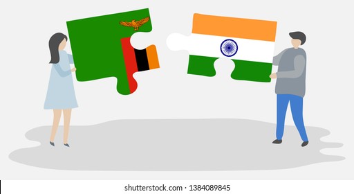 Couple holding two puzzles pieces with Zambian and Indian flags. Zambia and India national symbols together.