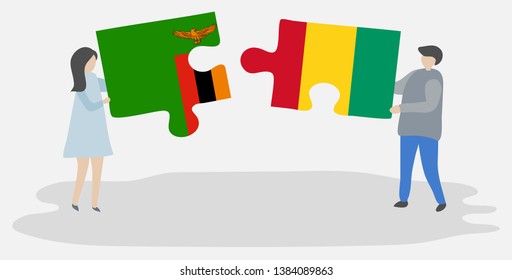 Couple holding two puzzles pieces with Zambian and Guinean flags. Zambia and Guinea national symbols together.