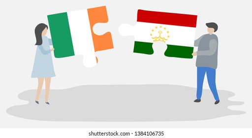 Couple holding two puzzles pieces with Irish and Tajikistani flags. Ireland and Tajikistan national symbols together.