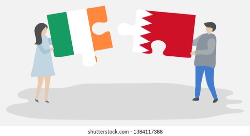 Couple holding two puzzles pieces with Irish and Bahraini flags. Ireland and Bahrain national symbols together.