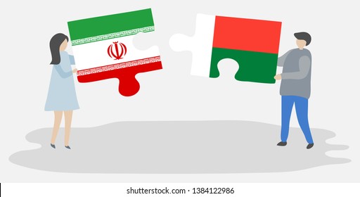 Couple holding two puzzles pieces with Iranian and Malagasy flags. Iran and Madagascar national symbols together.