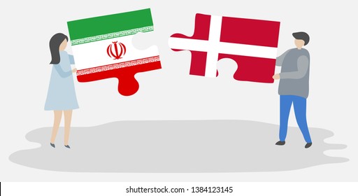 Couple holding two puzzles pieces with Iranian and Danish flags. Iran and Denmark national symbols together.