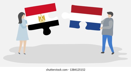 Couple holding two puzzles pieces with Egyptian and Dutch flags. Egypt and Netherlands national symbols together.