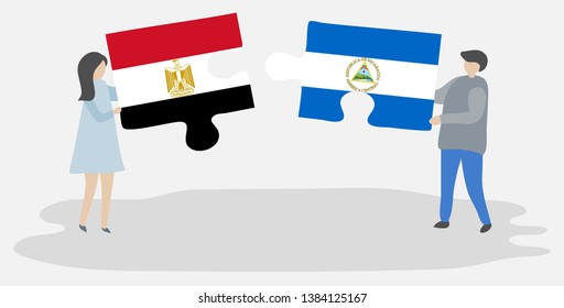 Couple holding two puzzles pieces with Egyptian and Nicaraguan flags. Egypt and Nicaragua national symbols together.