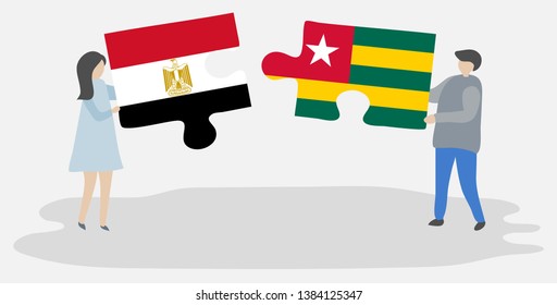 Couple holding two puzzles pieces with Egyptian and Togolese flags. Egypt and Togo national symbols together.