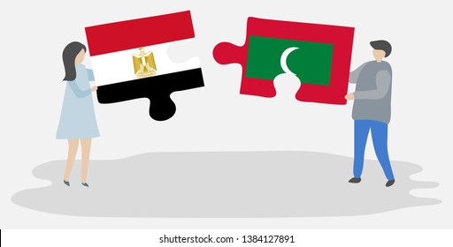 Couple holding two puzzles pieces with Egyptian and Maldivian flags. Egypt and Maldives national symbols together.