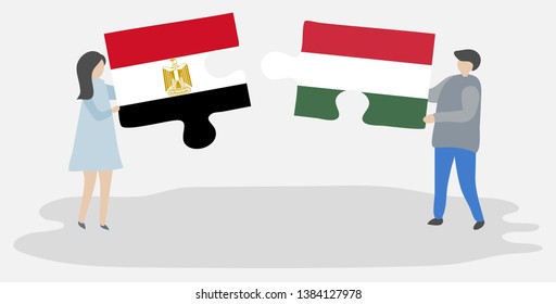 Couple holding two puzzles pieces with Egyptian and Hungarian flags. Egypt and Hungary national symbols together.