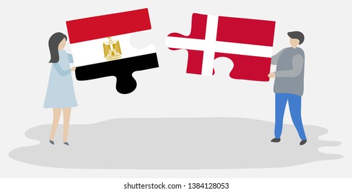 Couple holding two puzzles pieces with Egyptian and Danish flags. Egypt and Denmark national symbols together.