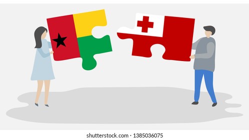 Couple holding two puzzles pieces with Bissau-Guinean and Tongan flags. Guinea-Bissau and Tonga national symbols together.