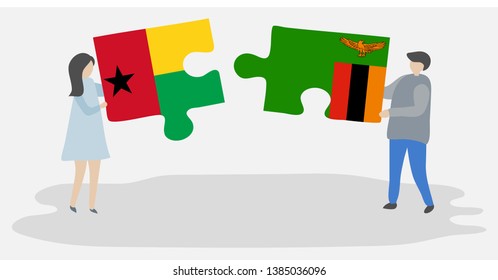 Couple holding two puzzles pieces with Bissau-Guinean and Zambian flags. Guinea-Bissau and Zambia national symbols together.