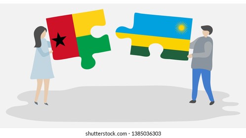 Couple holding two puzzles pieces with Bissau-Guinean and Rwandan flags. Guinea-Bissau and Rwanda national symbols together.