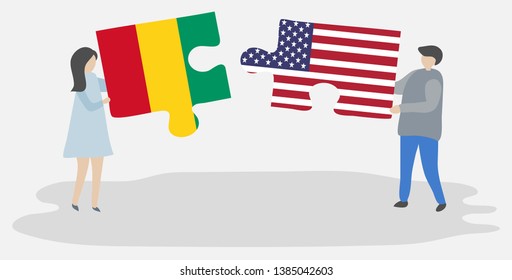 Couple holding two puzzles pieces with Guinean and American flags. Guinea and United States of America national symbols together.