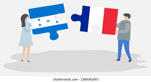 Couple holding two puzzles pieces with Honduran and French flags. Honduras and France national symbols together.