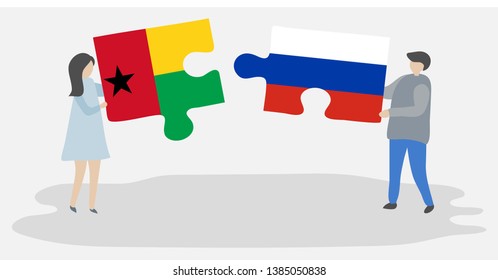 Couple holding two puzzles pieces with Bissau-Guinean and Russian flags. Guinea-Bissau and Russia national symbols together.