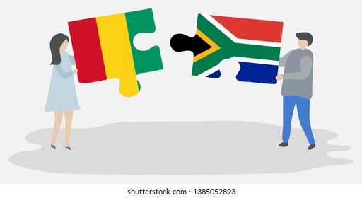 Couple holding two puzzles pieces with Guinean and South African flags. Guinea and South Africa national symbols together.