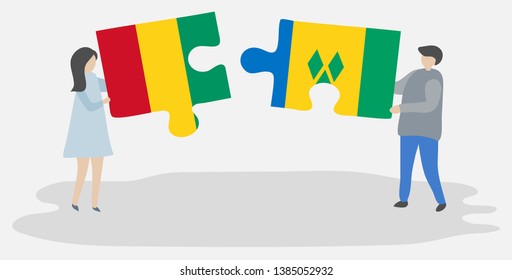 Couple holding two puzzles pieces with Guinean and Vincentian flags. Guinea and Saint Vincent and the Grenadines national symbols together.
