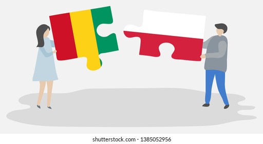 Couple holding two puzzles pieces with Guinean and Polish flags. Guinea and Poland national symbols together.