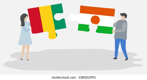Couple holding two puzzles pieces with Guinean and Nigerien flags. Guinea and Niger national symbols together.