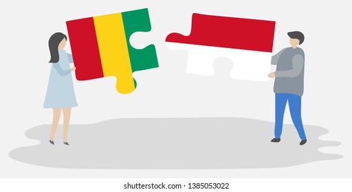 Couple holding two puzzles pieces with Guinean and Monegasque flags. Guinea and Monaco national symbols together.