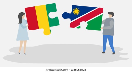 Couple holding two puzzles pieces with Guinean and Namibian flags. Guinea and Namibia national symbols together.