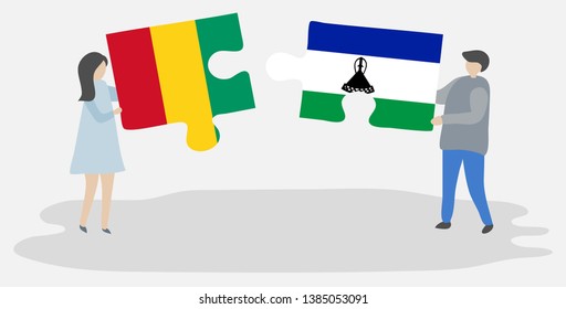 Couple holding two puzzles pieces with Guinean and Basotho flags. Guinea and Lesotho national symbols together.