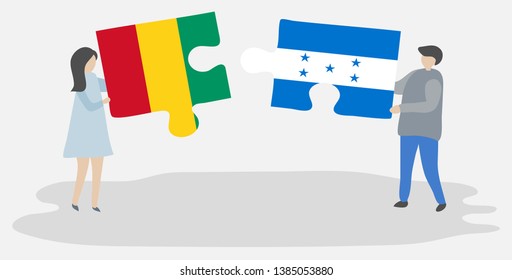 Couple holding two puzzles pieces with Guinean and Honduran flags. Guinea and Honduras national symbols together.