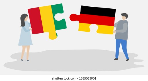 Couple holding two puzzles pieces with Guinean and German flags. Guinea and Germany national symbols together.