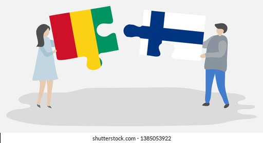 Couple holding two puzzles pieces with Guinean and Finnish flags. Guinea and Finland national symbols together.