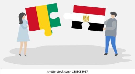 Couple holding two puzzles pieces with Guinean and Egyptian flags. Guinea and Egypt national symbols together.