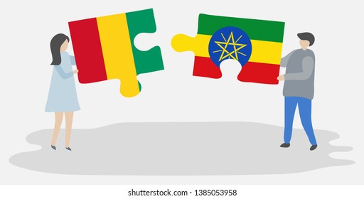 Couple holding two puzzles pieces with Guinean and Ethiopian flags. Guinea and Ethiopia national symbols together.