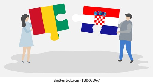 Couple holding two puzzles pieces with Guinean and Croatian flags. Guinea and Croatia national symbols together.