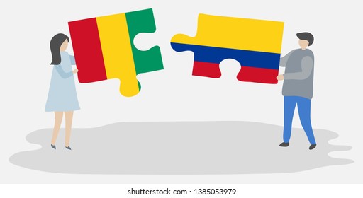 Couple holding two puzzles pieces with Guinean and Colombian flags. Guinea and Colombia national symbols together.