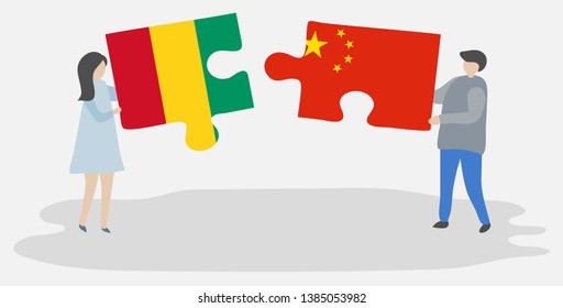 Couple holding two puzzles pieces with Guinean and Chinese flags. Guinea and China national symbols together.
