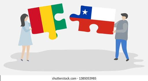 Couple holding two puzzles pieces with Guinean and Chilean flags. Guinea and Chile national symbols together.