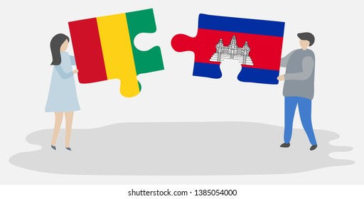 Couple holding two puzzles pieces with Guinean and Cambodian flags. Guinea and Cambodia national symbols together.