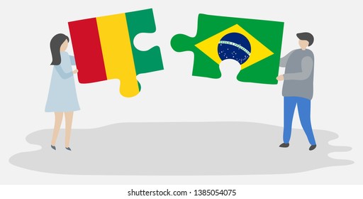 Couple holding two puzzles pieces with Guinean and Brazilian flags. Guinea and Brazil national symbols together.