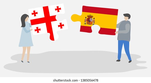Couple holding two puzzles pieces with Georgian and Spanish flags. Georgia and Spain national symbols together.